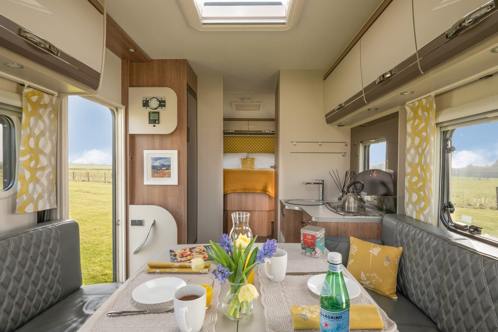 The L-shaped lounge and kitchen inside the Glamper