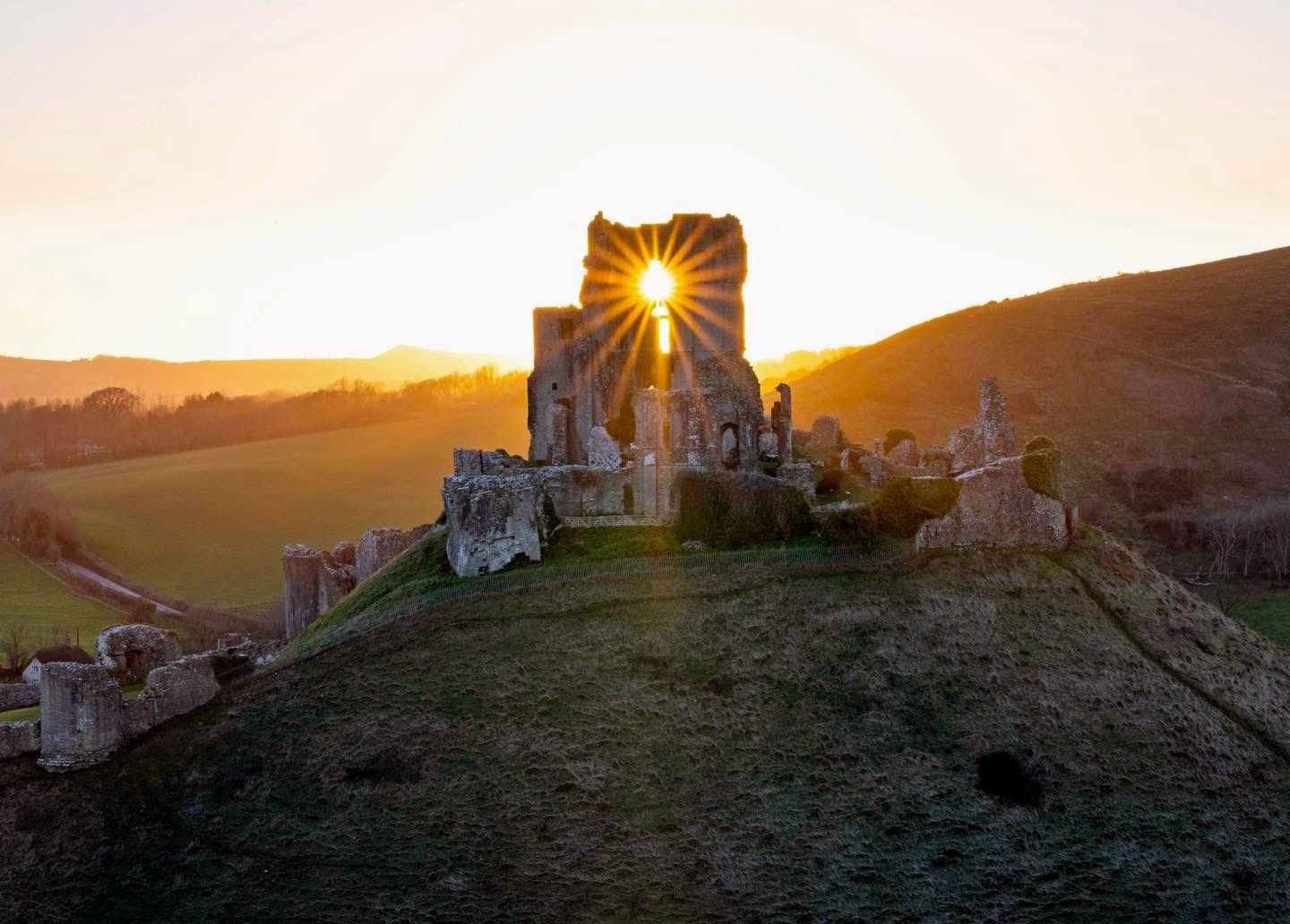 Corfe Castle ruins at sunrise, Isle of Purbeck