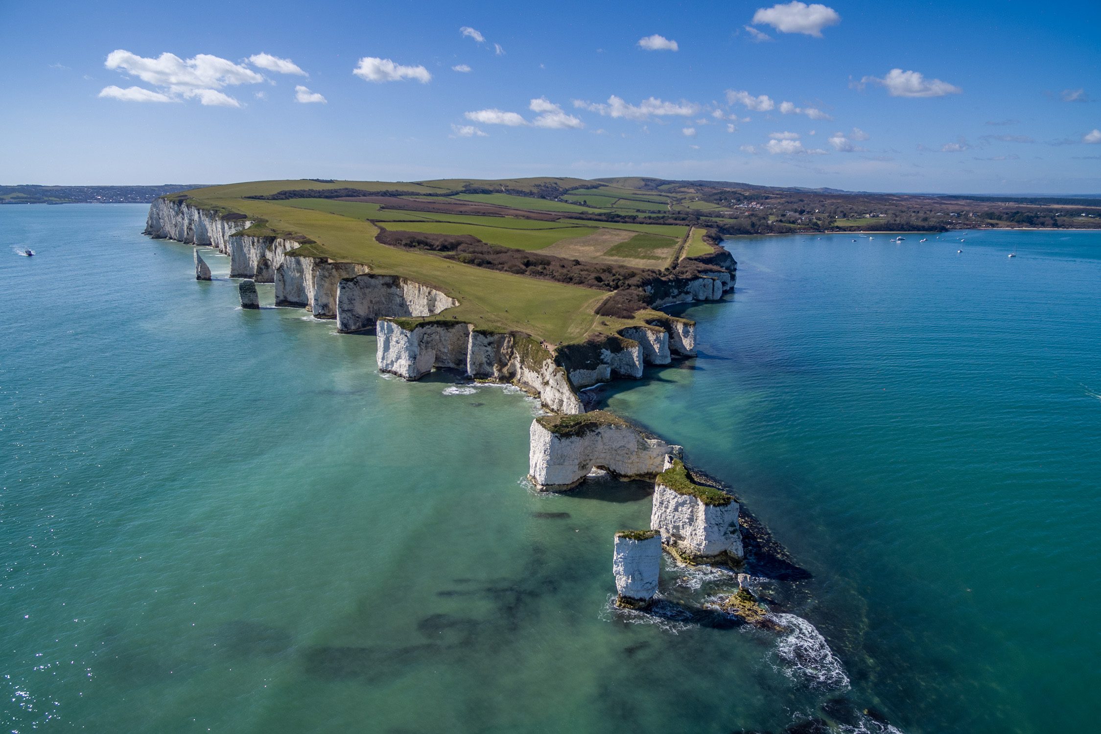 Aerial view of Old Harry Rocks chalk stacks and the Jurassic Coast, Dorset